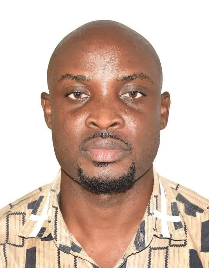 Professional headshot of John Atsu Agbolosoo